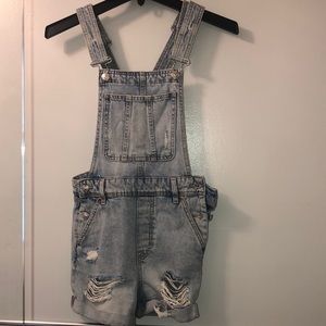 Ripped overall shorts